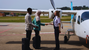 Aviation students training with IATA course materials.